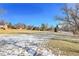 Large green space with partial snow coverage at 979 S Miller St # 202, Lakewood, CO 80226