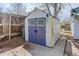 Outdoor shed with double doors and a white exterior at 1270 Elmira St, Aurora, CO 80010