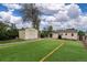 Spacious backyard featuring lush artificial grass and a charming shed for outdoor storage at 116 N Gilbert St, Castle Rock, CO 80104