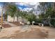 Relaxing backyard featuring a patio area with comfortable seating and a charming garden shed at 116 N Gilbert St, Castle Rock, CO 80104