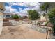 Inviting backyard patio featuring comfortable wicker seating, a stylish rug, and a beautifully designed outdoor space at 116 N Gilbert St, Castle Rock, CO 80104