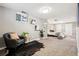 Finished basement with neutral paint, carpet and lots of open space for entertaining at 116 N Gilbert St, Castle Rock, CO 80104