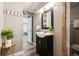 Charming bathroom features a modern vanity, stylish mirror, and a convenient walk-in shower at 116 N Gilbert St, Castle Rock, CO 80104