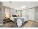 Comfortable bedroom featuring neutral tones, large closets, and natural light from the window at 116 N Gilbert St, Castle Rock, CO 80104