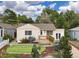Charming single-story home featuring a well-manicured front yard, complemented by lush landscaping and decorative shrubbery at 116 N Gilbert St, Castle Rock, CO 80104