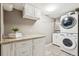 Efficient laundry room with ample counter space, modern washer, and dryer unit at 116 N Gilbert St, Castle Rock, CO 80104
