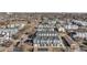 High aerial view showcasing rows of modern townhomes and neighborhood layout in an urban environment at 1810 Irving St # 8, Denver, CO 80204