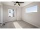 Bright bedroom featuring carpet flooring and large windows providing an abundance of natural light at 1810 Irving St # 8, Denver, CO 80204