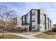Attractive exterior of modern townhomes with gray and white accents, showcasing contemporary design at 1810 Irving St # 8, Denver, CO 80204