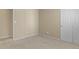 Neutral bedroom with closet and carpeted floors at 9860 Burberry Way, Highlands Ranch, CO 80129