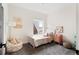 bedroom with playful decor and cheerful accents; perfect for a young  at 3285 Lawrence St, Denver, CO 80205