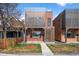 Modern home featuring striking brick facade and contemporary architectural details at 3285 Lawrence St, Denver, CO 80205