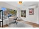 Bright office features a desk, chair, a large window, and ample space for work at 3285 Lawrence St, Denver, CO 80205