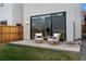 Outdoor patio with seating and a grassy yard at 3285 Lawrence St, Denver, CO 80205