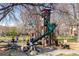 Community playground with slides and climbing structures, providing recreational space for families and children at 3285 Lawrence St, Denver, CO 80205