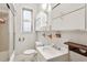 This bathroom features a single sink vanity and shower and tub combination at 4595 S Fox St, Englewood, CO 80110