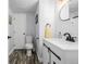 Clean bathroom with white vanity and modern fixtures at 1040 S Fulton Ave, Fort Lupton, CO 80621