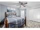 Spacious bedroom with wood flooring and a large bed at 1040 S Fulton Ave, Fort Lupton, CO 80621