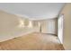 Empty bedroom with neutral walls, carpet flooring, and ample closet space at 9183 W Cedar Dr # 2, Lakewood, CO 80226