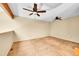 Spacious bonus room features carpet flooring and ceiling fans at 9183 W Cedar Dr # 2, Lakewood, CO 80226