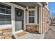 Inviting front entry featuring a wreath, a welcoming door mat, and stylish stonework at 14300 Waterside Ln # S2, Broomfield, CO 80023