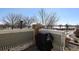 Cozy outdoor patio area with a grill and privacy fence at 14300 Waterside Ln # S2, Broomfield, CO 80023