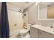 Bright bathroom with updated fixtures and shower-tub combination at 4162 S Richfield S Way, Aurora, CO 80013