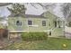 Charming green home with well-maintained landscaping and inviting entrance at 4162 S Richfield S Way, Aurora, CO 80013