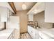 Functional kitchen with white cabinets, new faucet, and modern appliances at 4162 S Richfield S Way, Aurora, CO 80013
