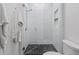 Elegant walk-in shower with modern tile and glass door; a luxurious space at 1265 S Gaylord St, Denver, CO 80210