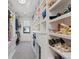 Walk-in closet with ample storage space and custom shelving for shoes and clothing at 1265 S Gaylord St, Denver, CO 80210