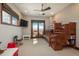 Spacious bedroom with a custom bunk bed, natural light, and a walkout to a scenic balcony at 8871 Aspen Leaf Ct, Littleton, CO 80125