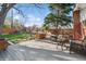 Outdoor space with deck, landscaping, and cozy wicker furniture, perfect for relaxing outdoors at 11600 W 31St Pl, Lakewood, CO 80215