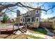 Backyard features a multi-level deck with stone accents and a well-maintained lawn at 789 Zamia Ave, Boulder, CO 80304