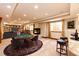 Finished basement featuring a fireplace, game table, and a wet bar for entertaining at 789 Zamia Ave, Boulder, CO 80304