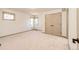 Neutral bedroom with double closet features neutral carpet and walls at 789 Zamia Ave, Boulder, CO 80304