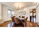 Charming dining room with a coffered ceiling, elegant chandelier, and natural light, ideal for Gathering gatherings at 789 Zamia Ave, Boulder, CO 80304