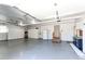 Spacious garage with ample storage cabinets and epoxy flooring at 789 Zamia Ave, Boulder, CO 80304