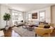 Comfortable living room with large windows, modern furniture, and a cozy atmosphere, perfect for relaxation and entertaining at 789 Zamia Ave, Boulder, CO 80304