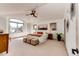 Bright main bedroom boasts a ceiling fan, natural light and mountain views at 789 Zamia Ave, Boulder, CO 80304