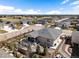 Scenic aerial view of a residential area showcasing well-maintained homes and large yards at 1694 Castle Vista Way, Castle Rock, CO 80104