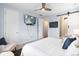 This bedroom features a barn door and TV, providing a comfortable and convenient entertainment space at 1694 Castle Vista Way, Castle Rock, CO 80104