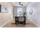 Dining room with a table set for six, neutral walls, and modern decor at 1694 Castle Vista Way, Castle Rock, CO 80104