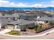 View of a suburban neighborhood with mountains in the background at 1694 Castle Vista Way, Castle Rock, CO 80104