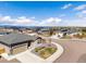 An exterior of a suburban home with beautiful landscaping and a picturesque neighborhood at 1694 Castle Vista Way, Castle Rock, CO 80104