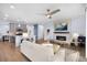 Inviting living space seamlessly connected to the kitchen and dining area at 1694 Castle Vista Way, Castle Rock, CO 80104
