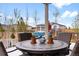 Cozy patio featuring comfortable seating and a stylish outdoor dining area at 1694 Castle Vista Way, Castle Rock, CO 80104