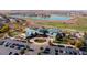 Aerial view of community clubhouse and golf course at 7800 E 148Th Dr, Thornton, CO 80602