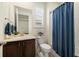 Clean bathroom with shower/tub combo and updated vanity at 7800 E 148Th Dr, Thornton, CO 80602