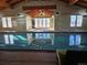 Indoor pool and hot tub with large windows at 7800 E 148Th Dr, Thornton, CO 80602